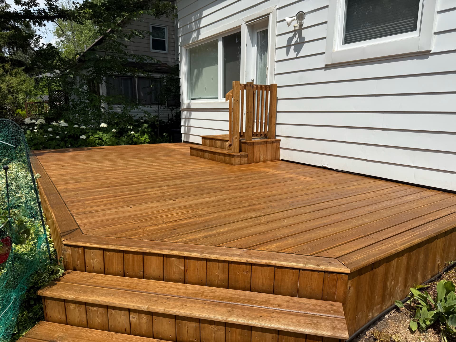 Deck stained with Golden Pine
