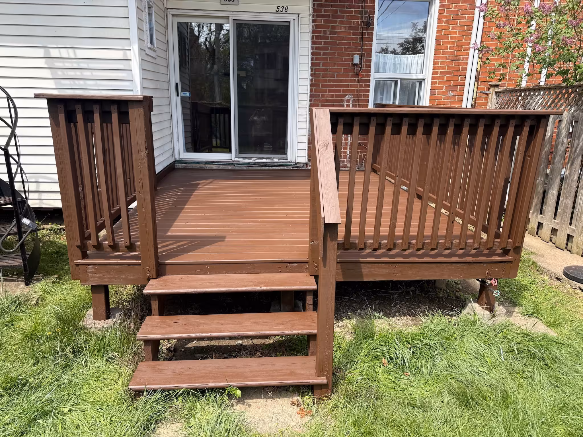 Deck stained with Tudor Brown